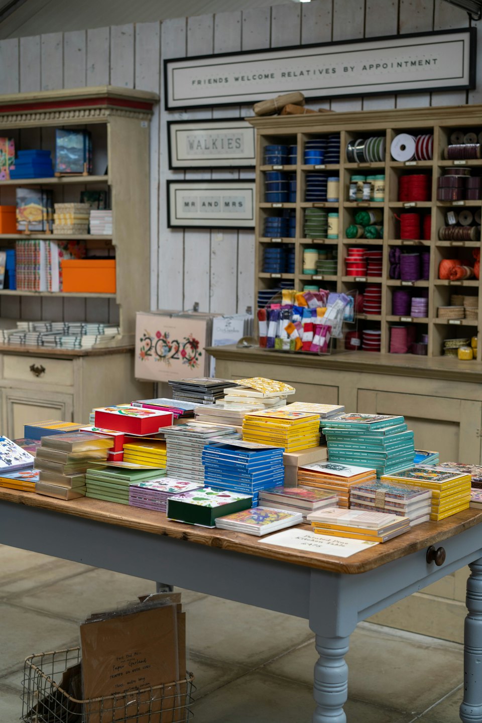 Specials Stationery items arranged on a wooden table in a store.